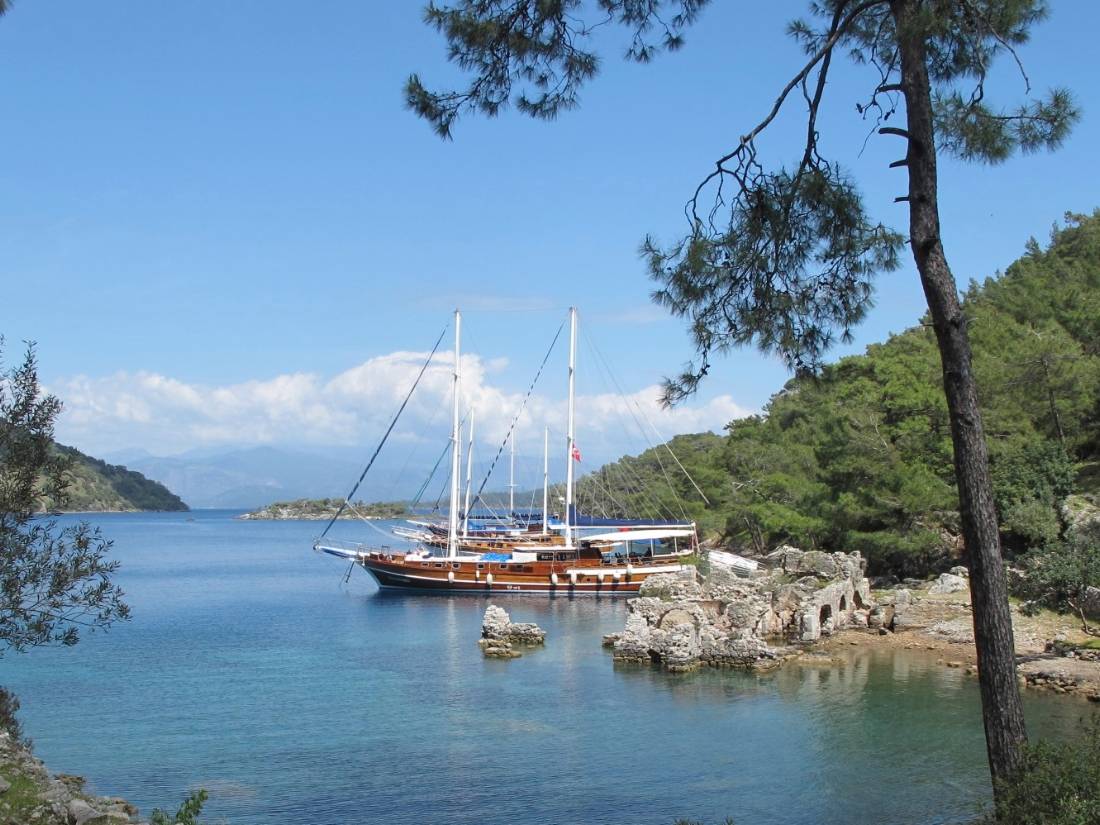 Boat moored at the ruins of 'Cleopatra's baths' on our Turkey Walk & Sail |  <i>Kate Baker</i>