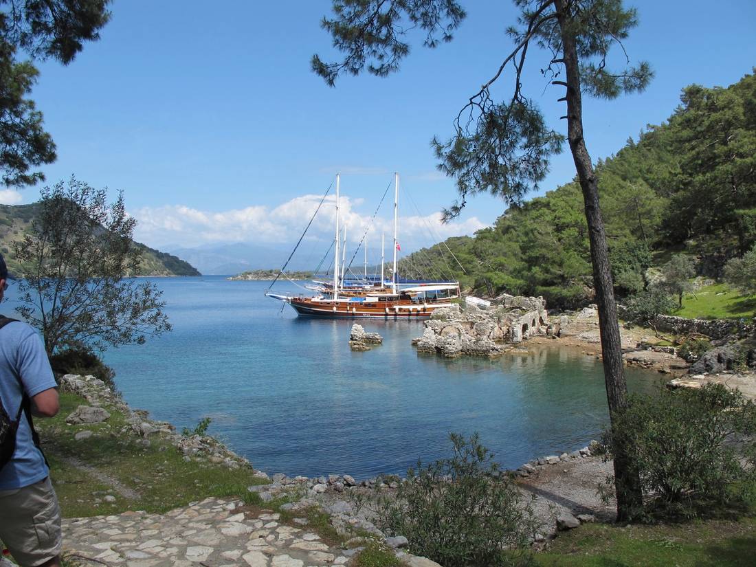 Boat moored at the ruins of 'Cleopatra's baths' on our Turkey Walk & Sail |  <i>Kate Baker</i>