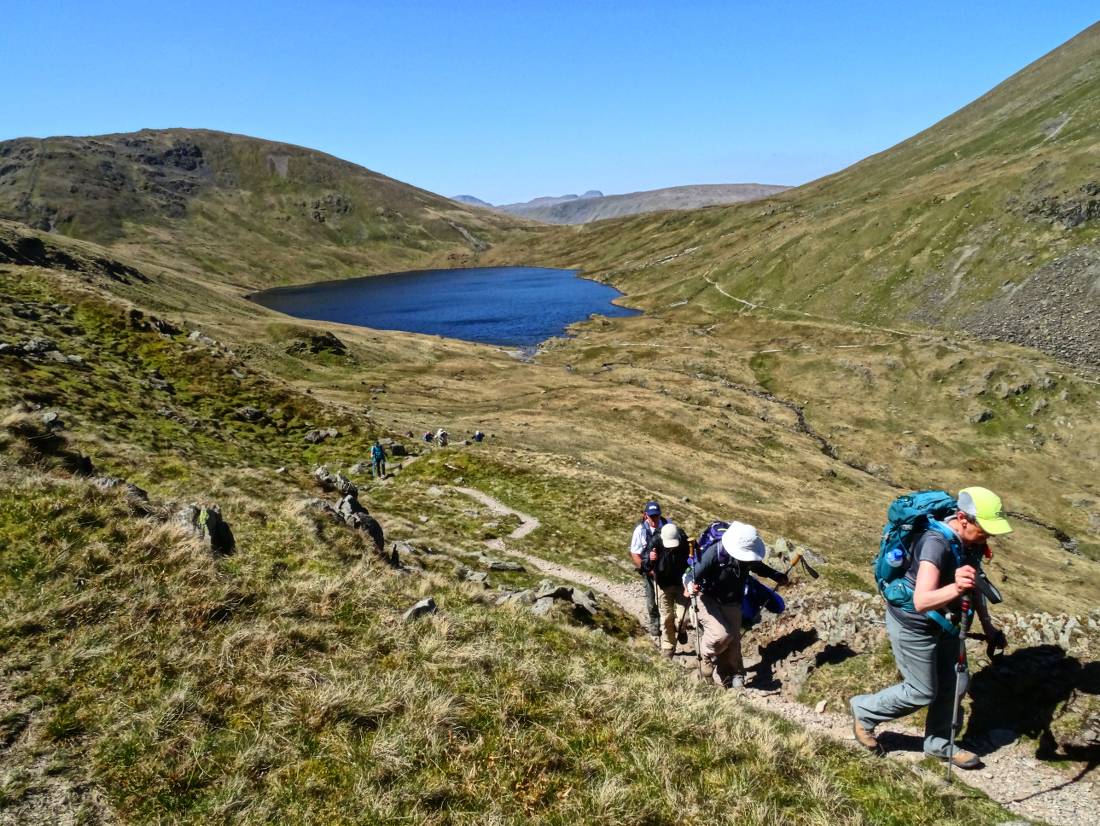 Hikers above Grizedale Tarn in the Lake District |  <i>John Millen</i>