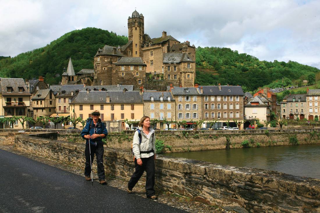 Hikers leaving Estaing on the Way of St James