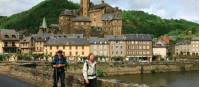 Hikers leaving Estaing on the Way of St James