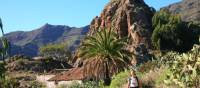 A hiker walking through Benchijigua in Gomera