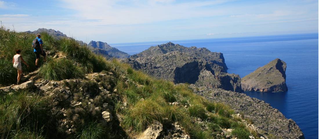 Walkers heading round the coast to Cala Codolar |  <i>John Millen</i>