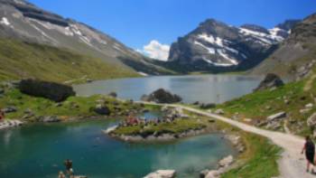 Gemmi pass Wildstrubel Switzerland,John Millen Hikers skirting glacial lakes on the way to Gemmi pass