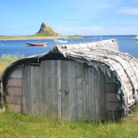 Fisherman's hut in old boat | John Millen