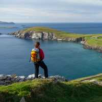 Hiker enjoying the view from Slea Head, Dingle | Gareth McCormack