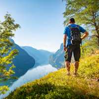 Taking in the mountain scenery while hiking through Norway’s fjord country. | norwaysbest.com / Sverre Hjornevik