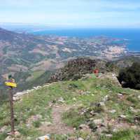 A hiker takes in the views from Col de Querroig at the border between France & Spain | Alan Mattingly