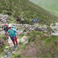 Hikers ascending The Loft Beck, Coast to Coast Walk | John Millen