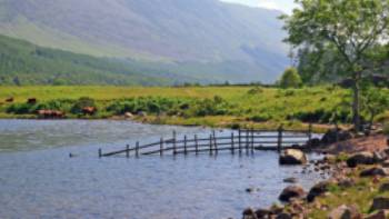 Reaching the end of Ennerdale Water with Red Pike in the distance