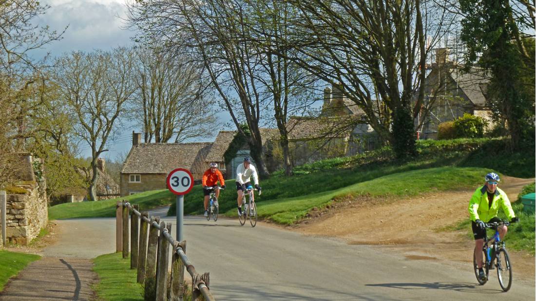 Cycling into Guiting Power |  <i>John Millen</i>