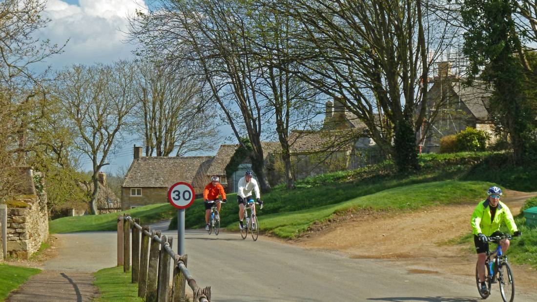 Cycling into Guiting Power |  <i>John Millen</i>