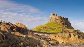 Lindisfarne Castle,Dave Head Lindisfarne in Northumberland, seen from the rock pools