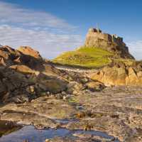 Lindisfarne in Northumberland, seen from the rock pools | Dave Head