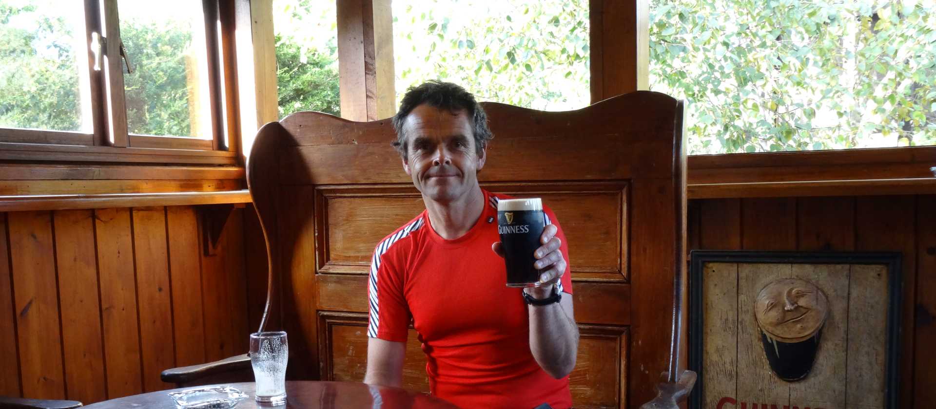 Having a pint at the pub after a hard day's walk. | John Millen