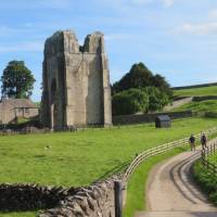 Walkers leaving Shap Abbey | John Millen