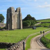 Walkers leaving Shap Abbey | John Millen