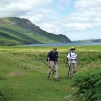 Walkers on the Coast to Coast Trail by Ennerdale Water