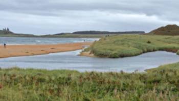 Walking up to Dunstanburgh Castle, Northumberland