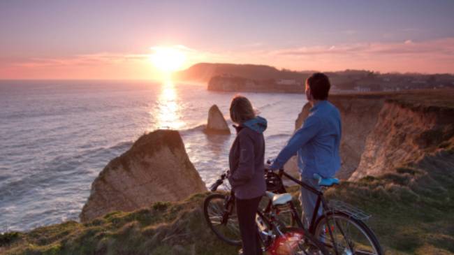 Watch the sun set over the famous Needles, Isle of Wight | visitisleofwight.co.uk