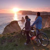 Watch the sun set over the famous Needles, Isle of Wight | visitisleofwight.co.uk