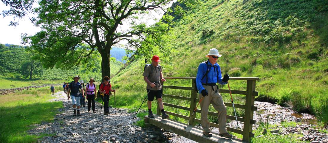 Our group crosses a stream on Wainwright's Coast to Coast walk |  <i>John Millen</i>