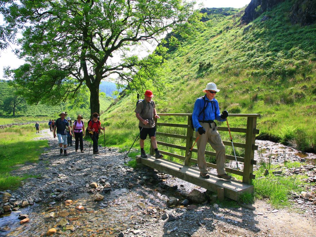 Our group crosses a stream on Wainwright's Coast to Coast walk |  <i>John Millen</i>