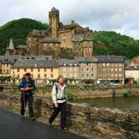 Hikers leaving Estaing on the Way of St James