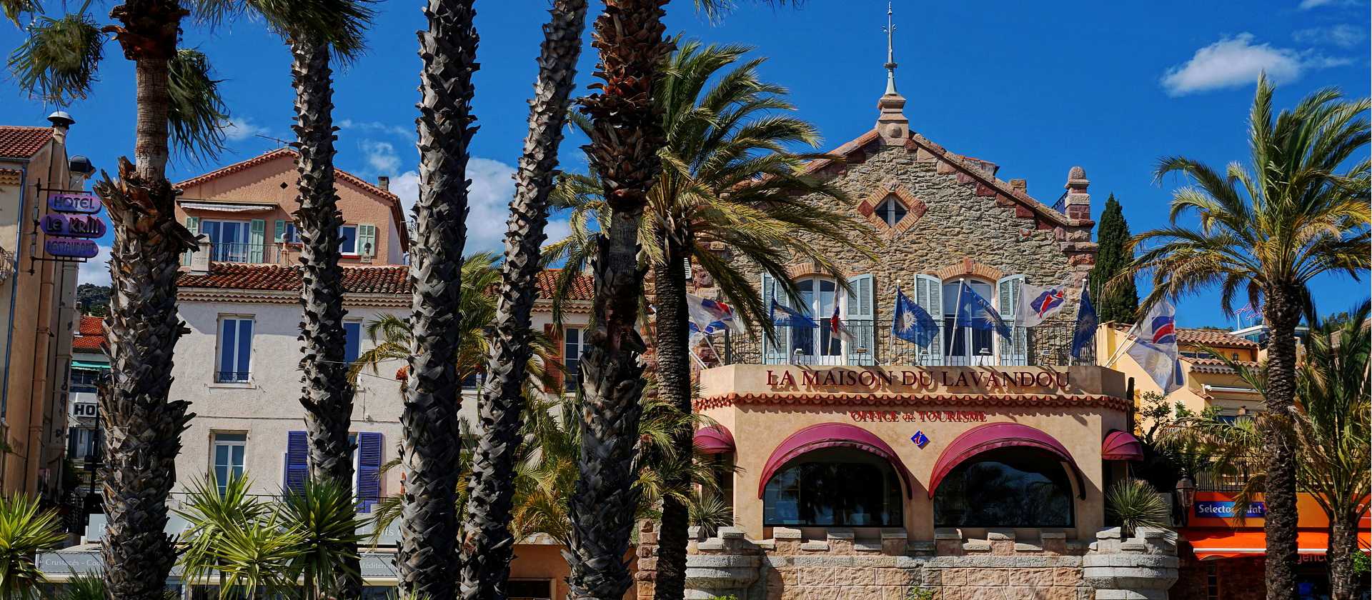 Le Lavandou's main square, bustling with shops and cafés