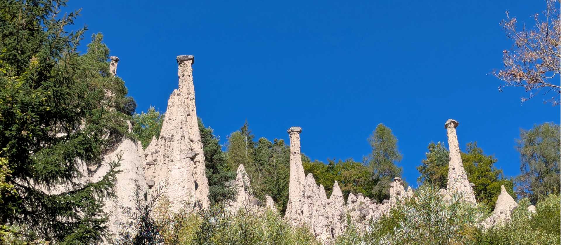 capped erosion pillars near Colalbo | John Millen