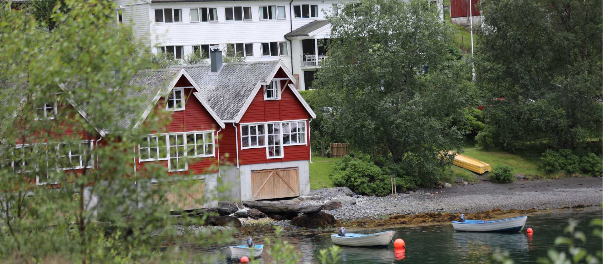 Heimly Pension and boathouses, Flam | John Millen