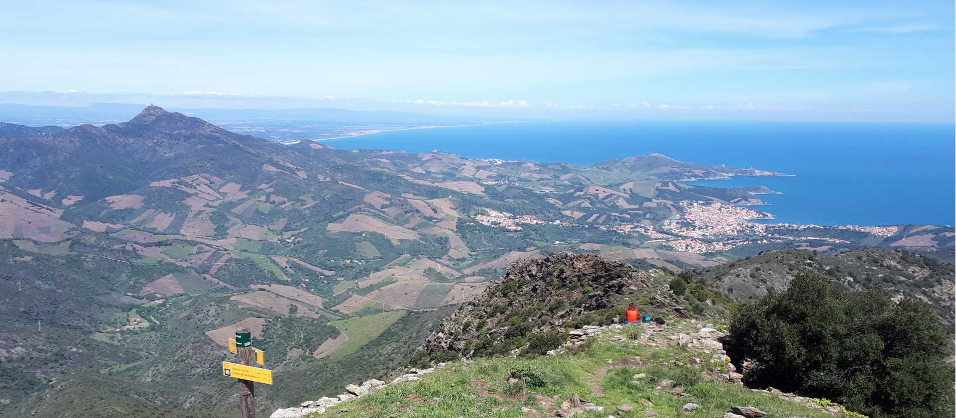 A hiker takes in the views from Col de Querroig at the border between France & Spain | Alan Mattingly