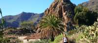 A hiker walking through Benchijigua in Gomera