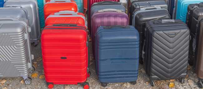 Suitcases being transferred, arriving at next accommodation.