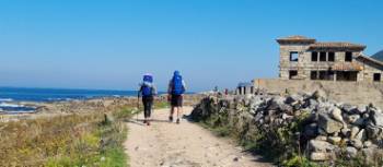 Pilgrims walking the coastal way of the Portuguese Camino | John Parker
