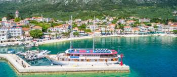 The deluxe category boat Harmonia docked in a Croatian harbour