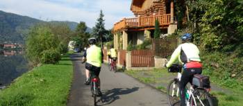 Cycling past traditional houses near Ústí nad Labem