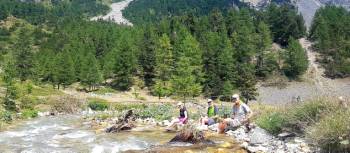 Rest stop with an impromptu foot soak in the Alps | Vincent Lamy