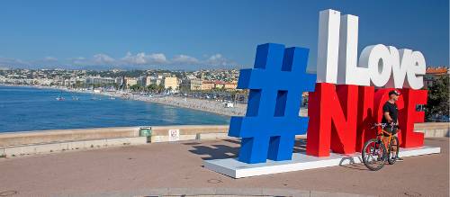 Cyclist posing for a photo in Nice, the starting point of the Nice to Genoa Cycle | Andrew Bain