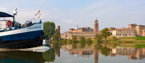 Travel past authentic Italian villages by bike or boat in the Veneto region