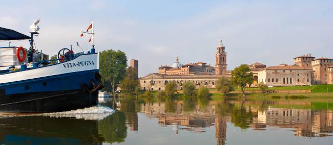 Travel past authentic Italian villages by bike or boat in the Veneto region