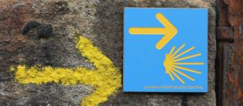 Portuguese Camino sign showing the way to Santiago de Compostela in Spain | Jaclyn Lofts