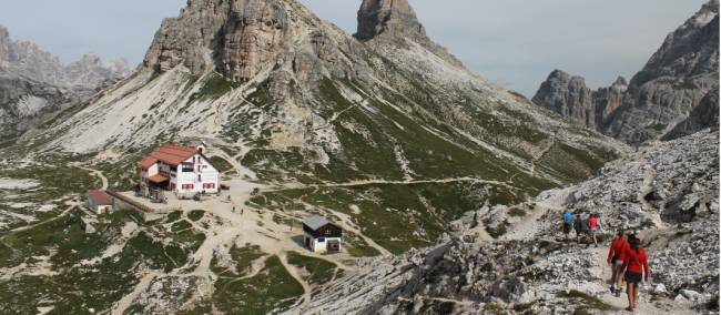 View to rifugio while hiking on a group trip in the Dolomites | Jaclyn Lofts